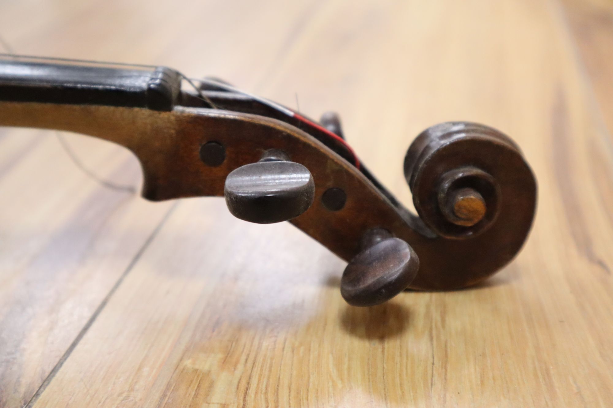 A violin labelled W Placht & Co, 58cm, cased